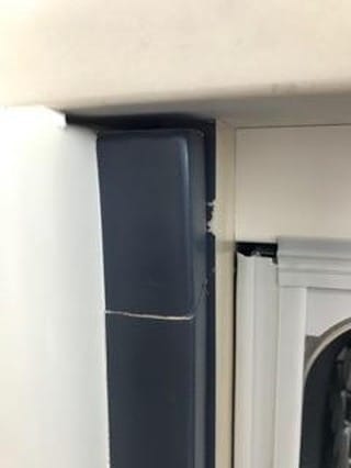 Custom cabinet frame with a cracked panel.