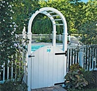 White garden gate with an archway.