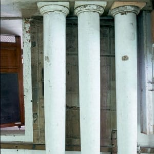 old salvaged white columns