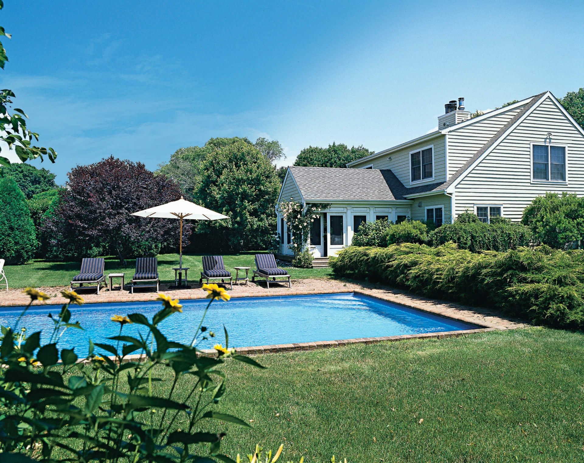 Rear of house with swimming pool.