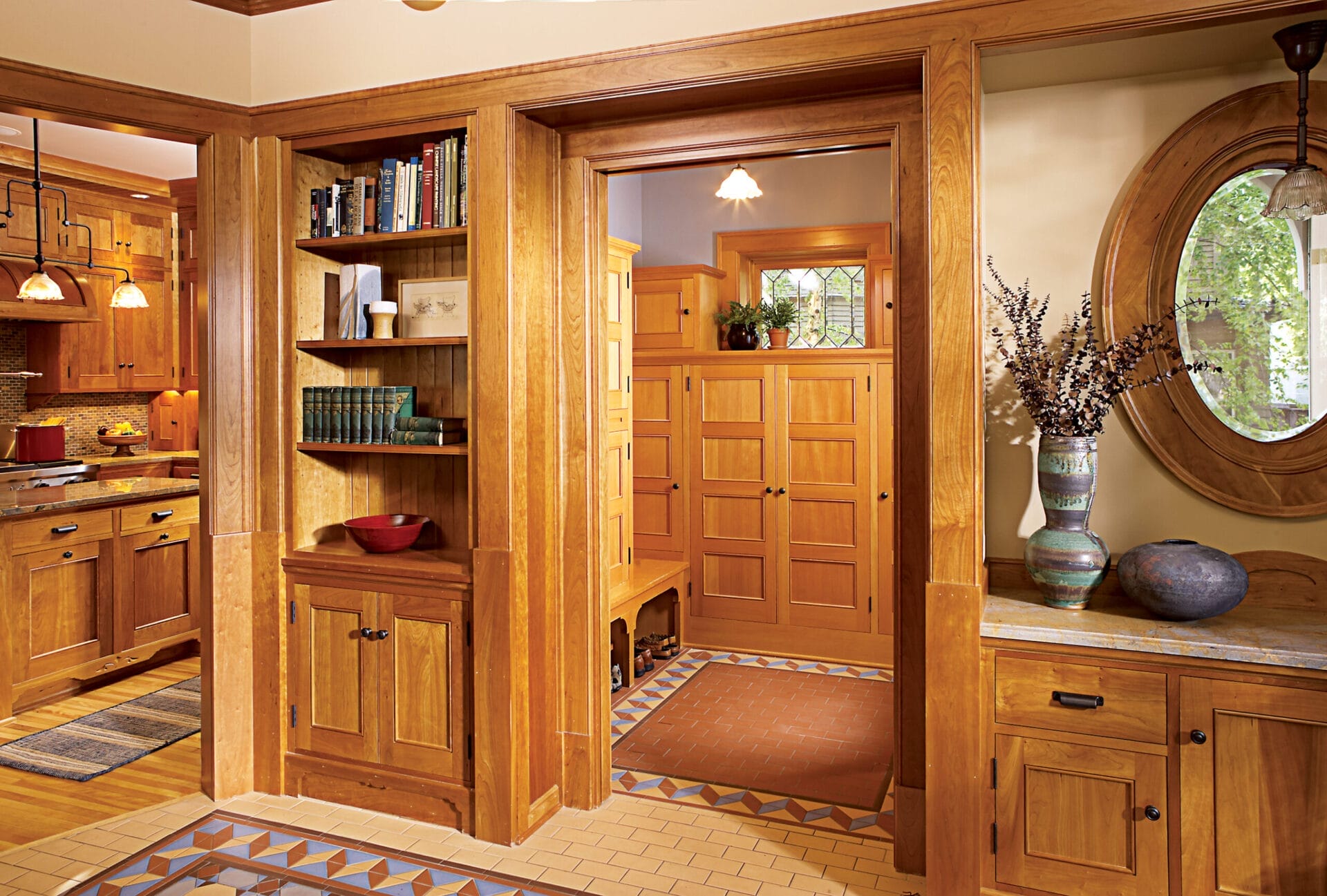 A kitchen and mudroom of a house
