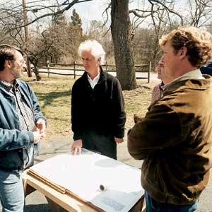 Four people having a conversation.