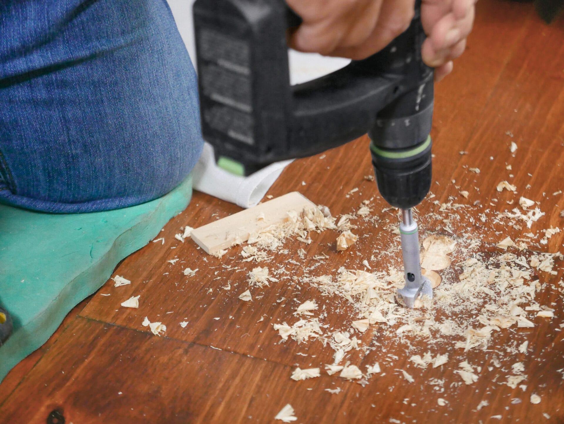 cutting a mortise in a wood floor to fix a crack