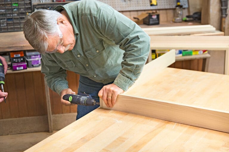 Silva Drills together pieces of wood for the outer frame of the chalkboard.