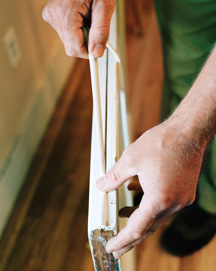 Image representing the sixth step of how to weatherstrip a double-hung window, which is to weatherstrip the window