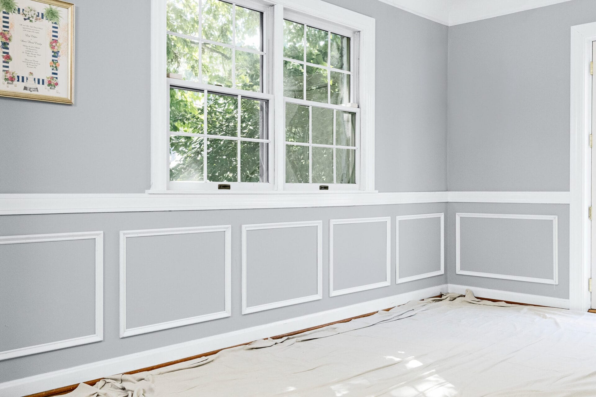 The finished room with painted wainscoting. 