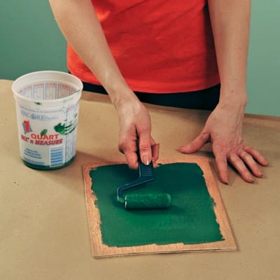 painting a wooden board green