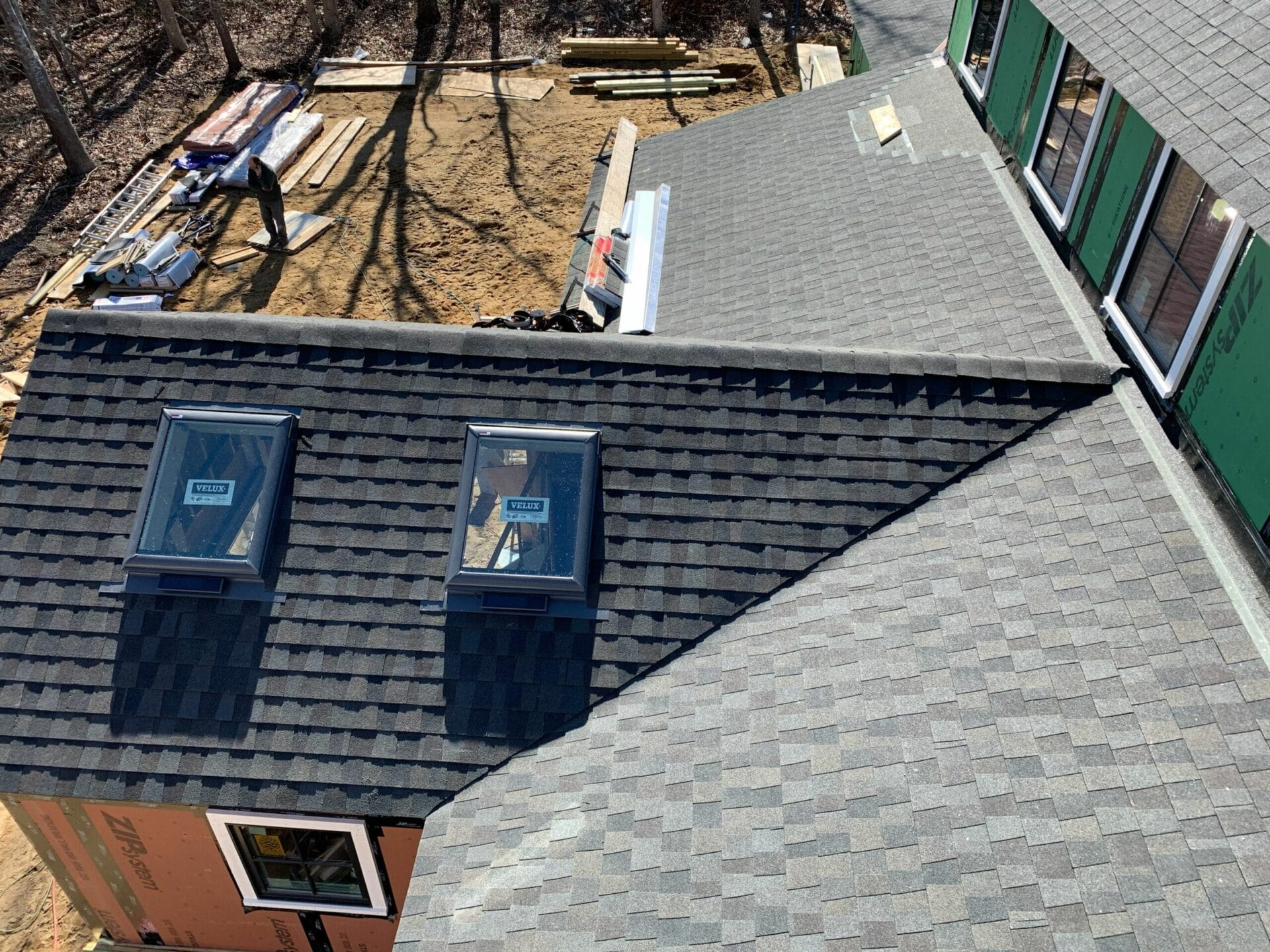 Two skylights on a roof.