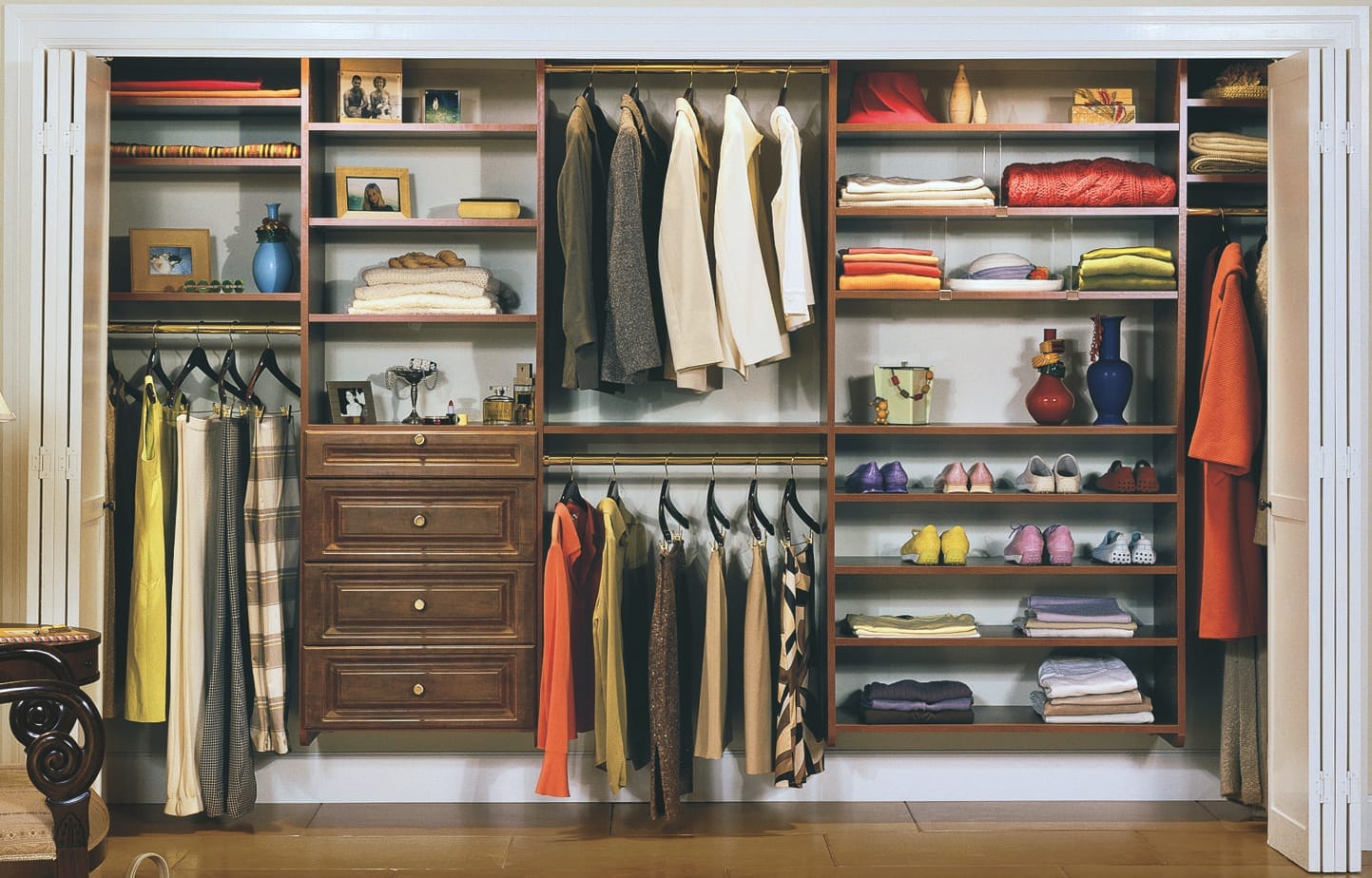 a completed closet system where all items are organized