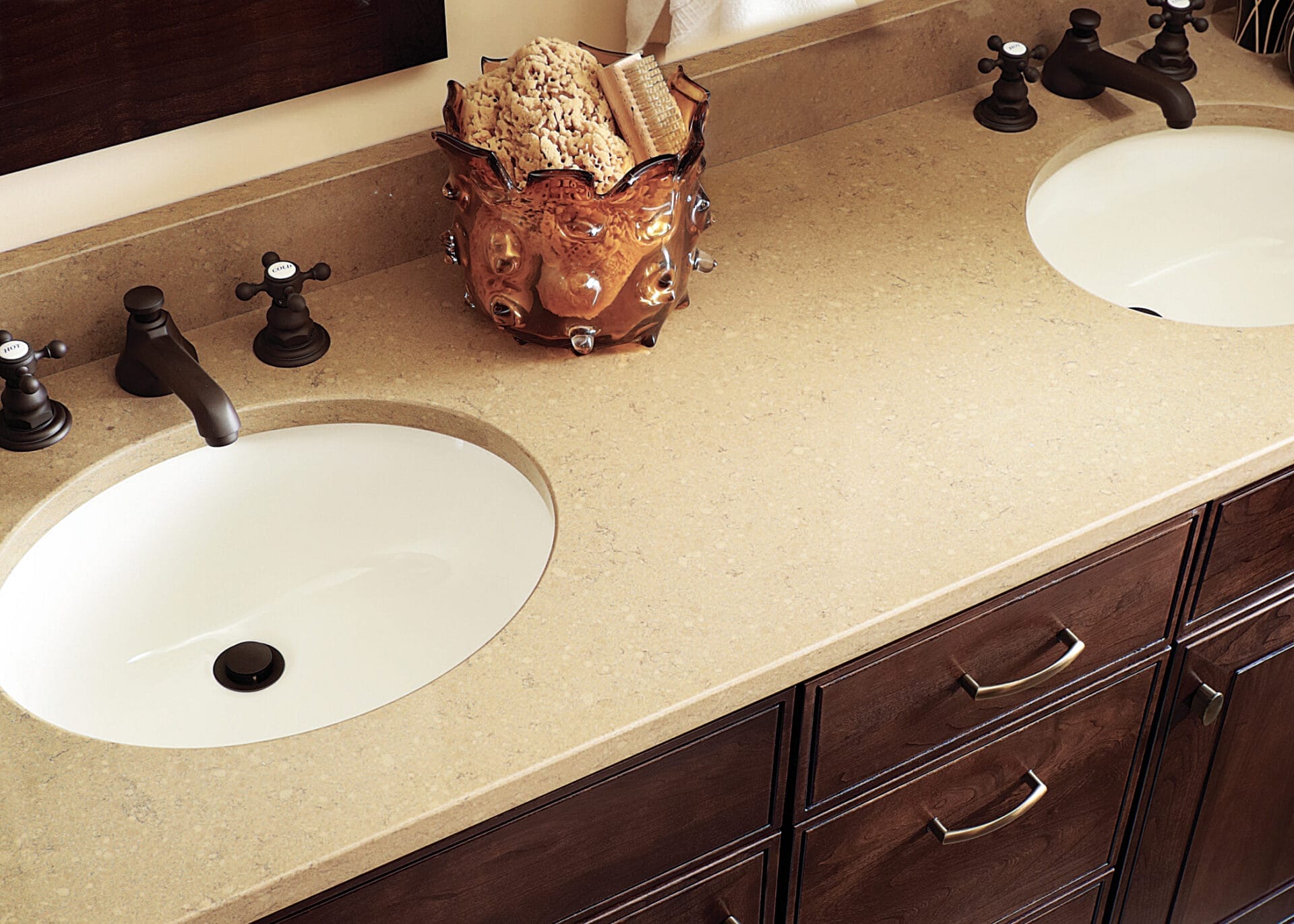 Prefab quartz vanity top with integrated sink cutout.
