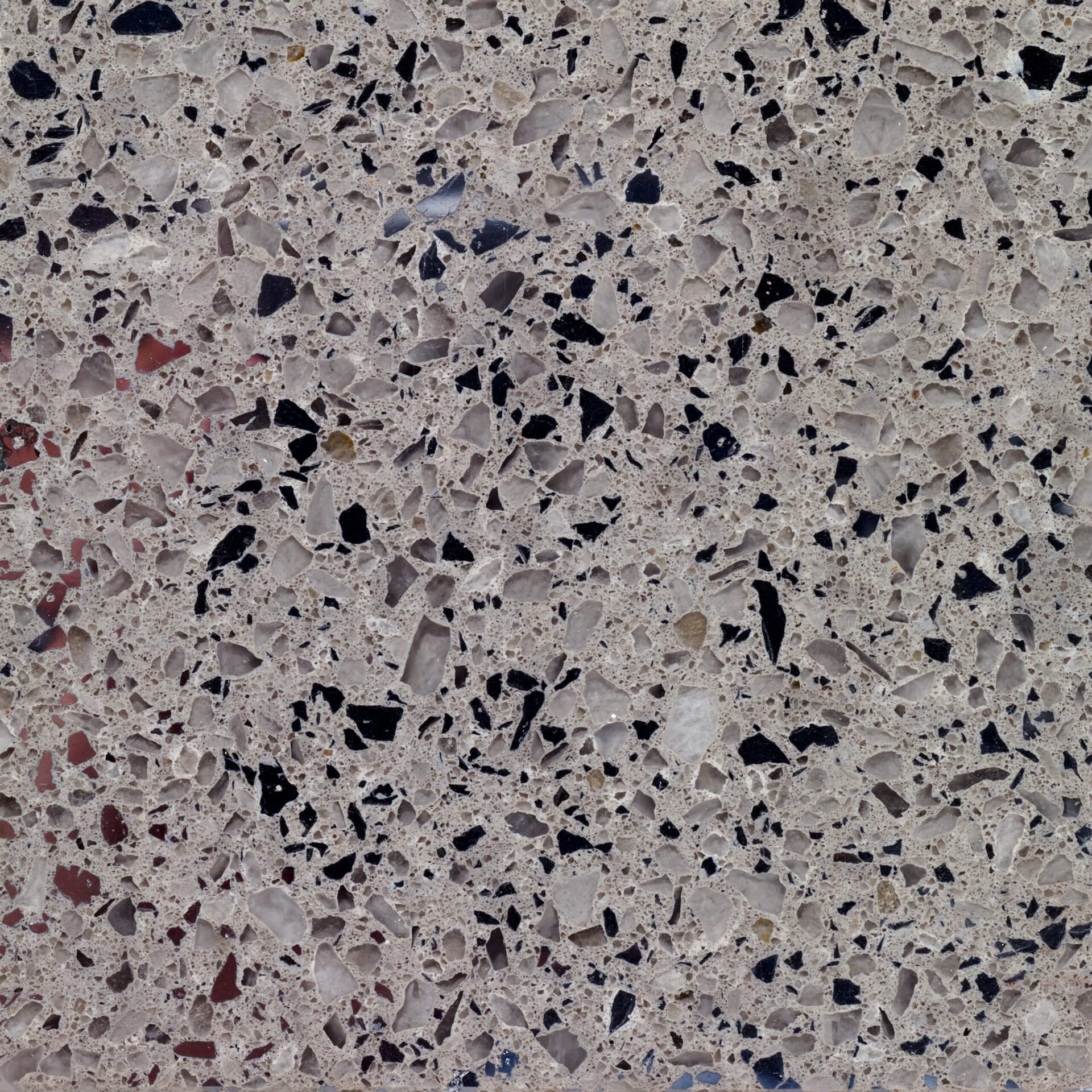 Metallic quartz with steel flecks providing polished reflective shine.