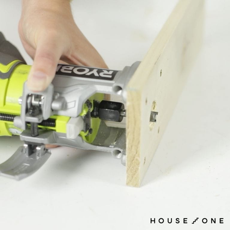 Adjust the router bit depth for the board for a circle jig.