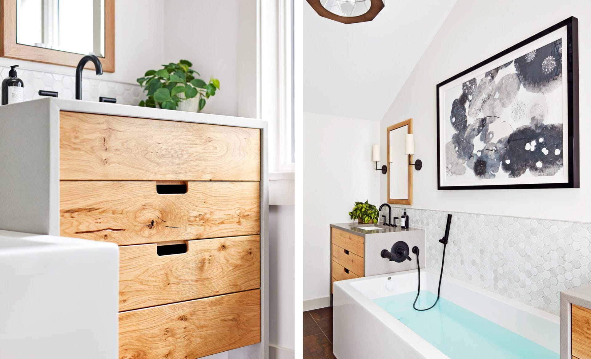 A small bathroom with a tub, sink and framed artwork.
