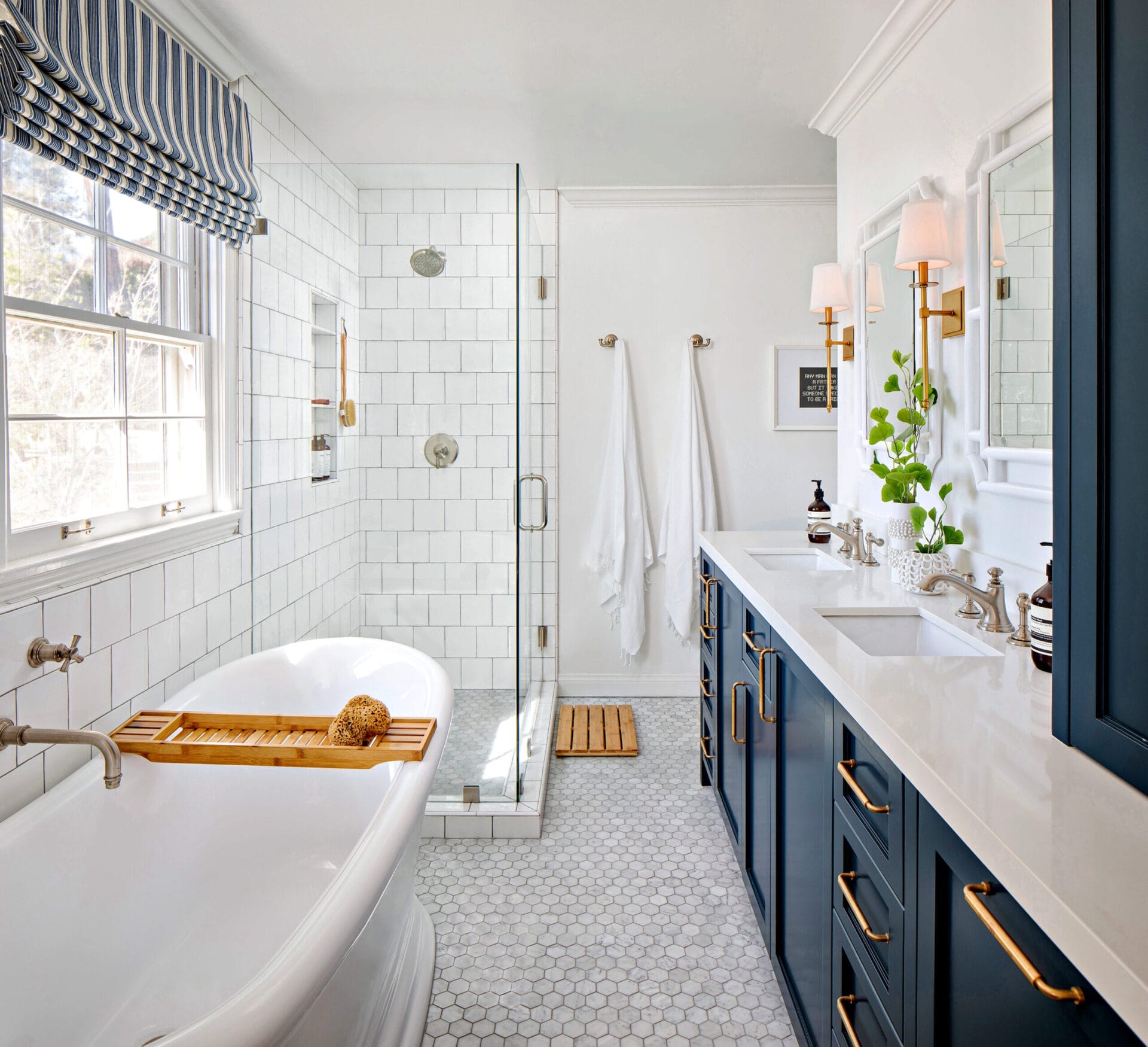 A small bathroom with a tub, shower, and 2 sinks.