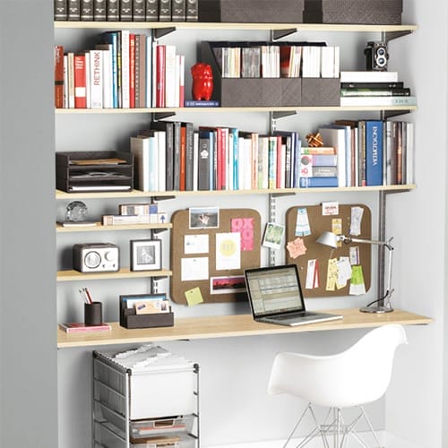A closet that has been repurposed into a home office.