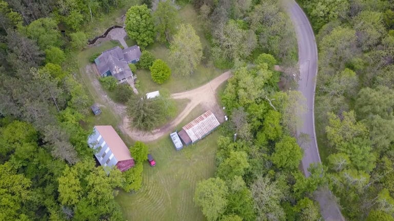 St. Croix River Valley wooded property with slopes and elevation changes.