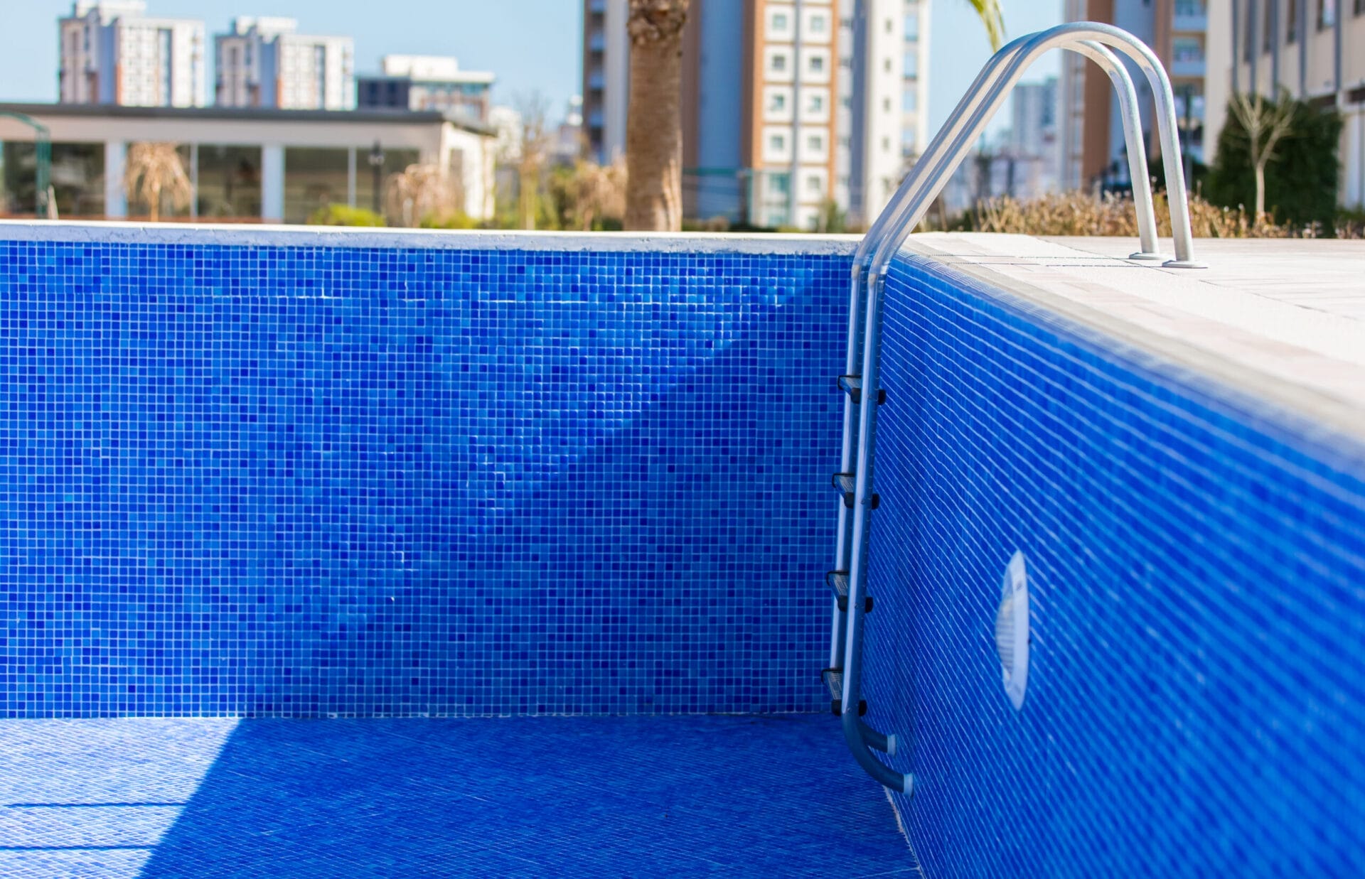 A swimming pool that has been drained.