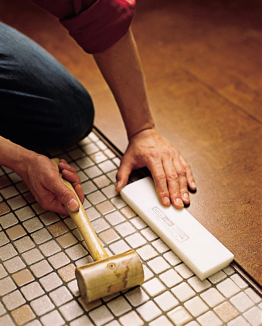 Fitting cork flooring for proper spacing 