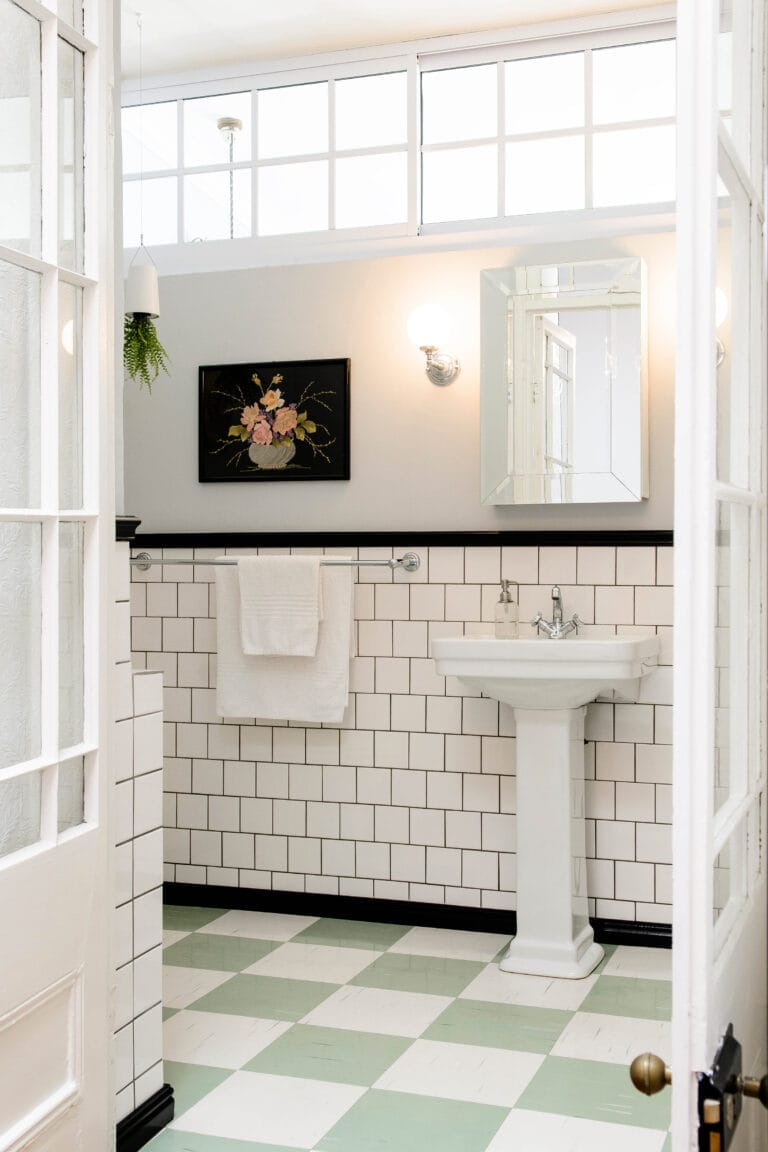 A bathroom with affordable linoleum flooring.