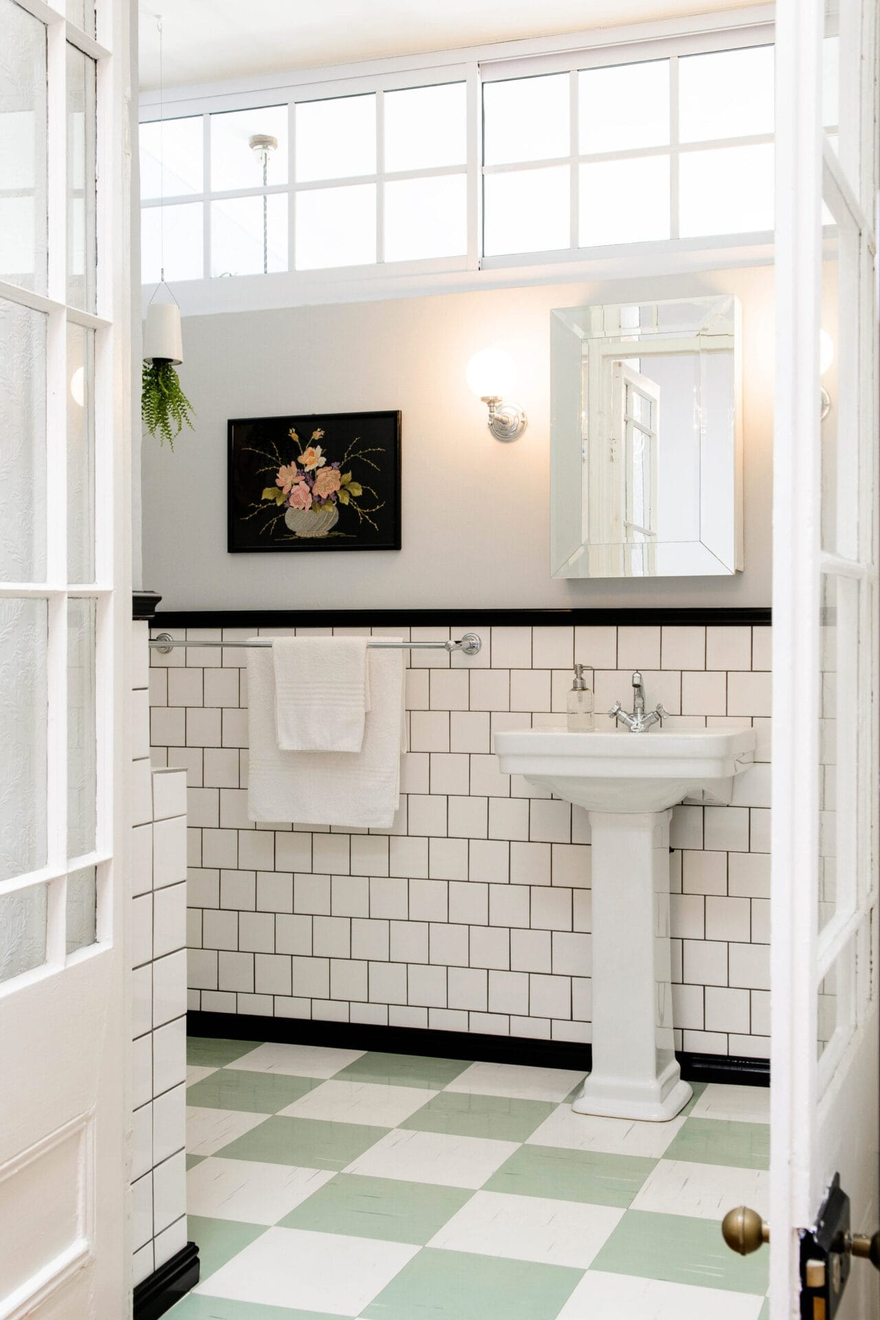 A bathroom with affordable linoleum flooring.