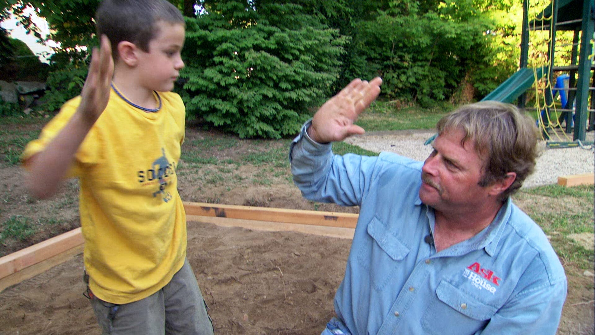 S23 E25: Roger Cook gives a high five to a kid