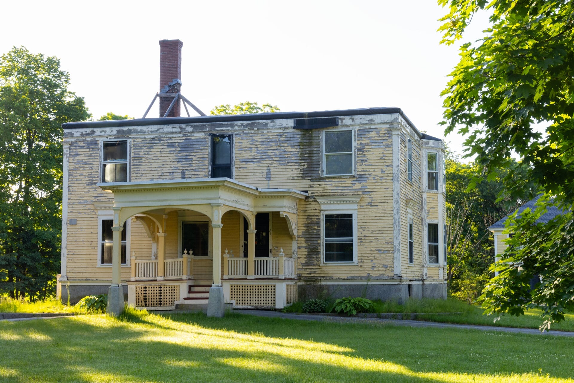 House with fire damage and no roof